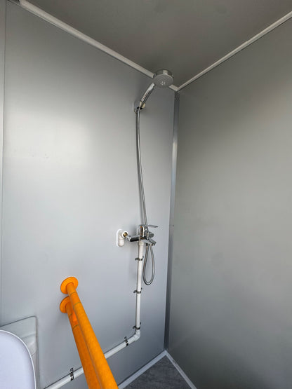 Premium Plumbed-In disability-friendly Portable Toilet With Shower Unit with WPC Fluted Wall Cladding – Fully Built & Ready to Use
